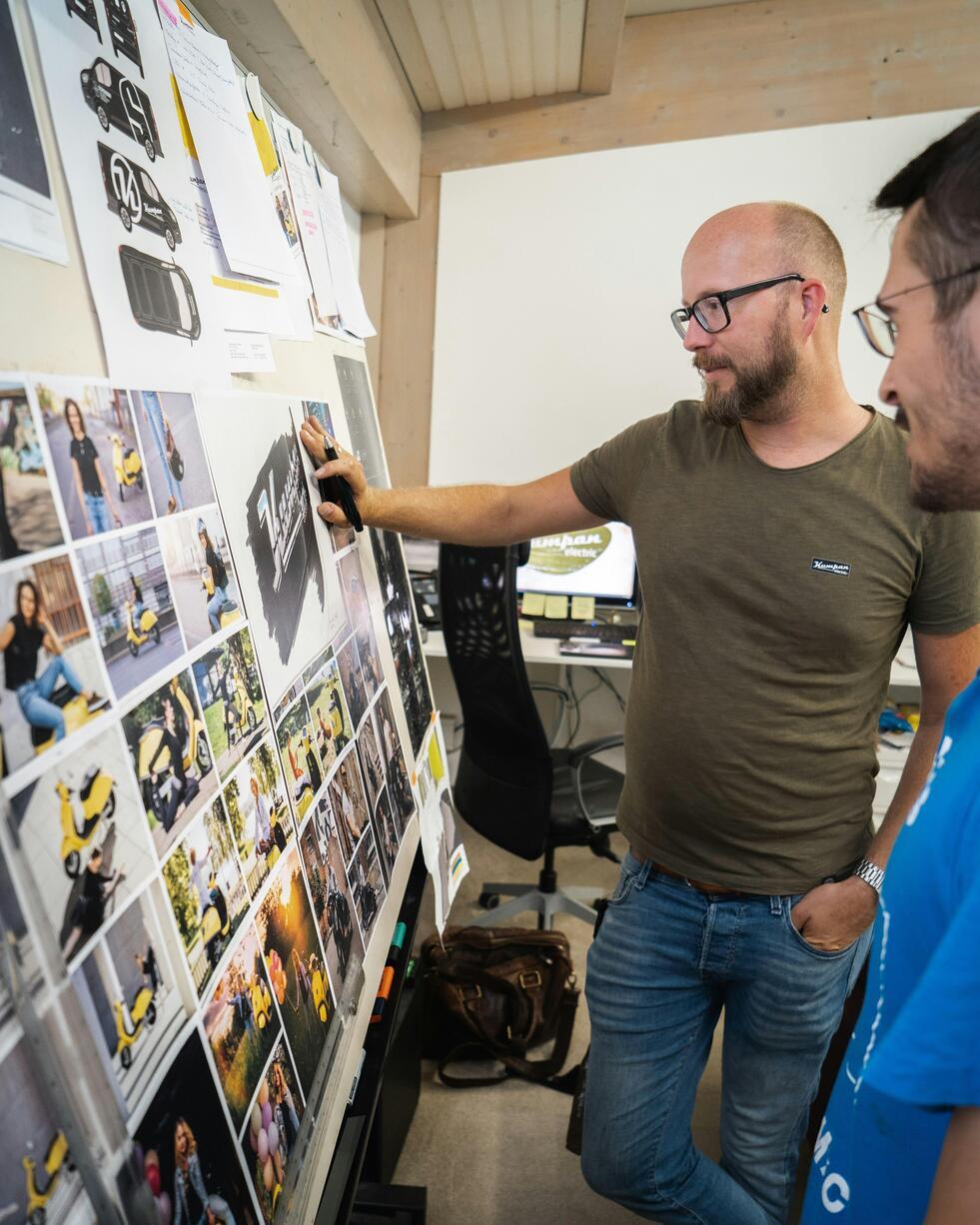 A diverse cross-border team collaborating on a project