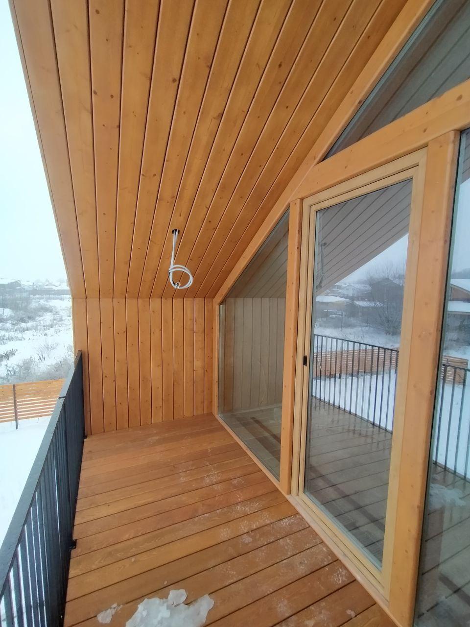 Отделка фасада деревянного дома.