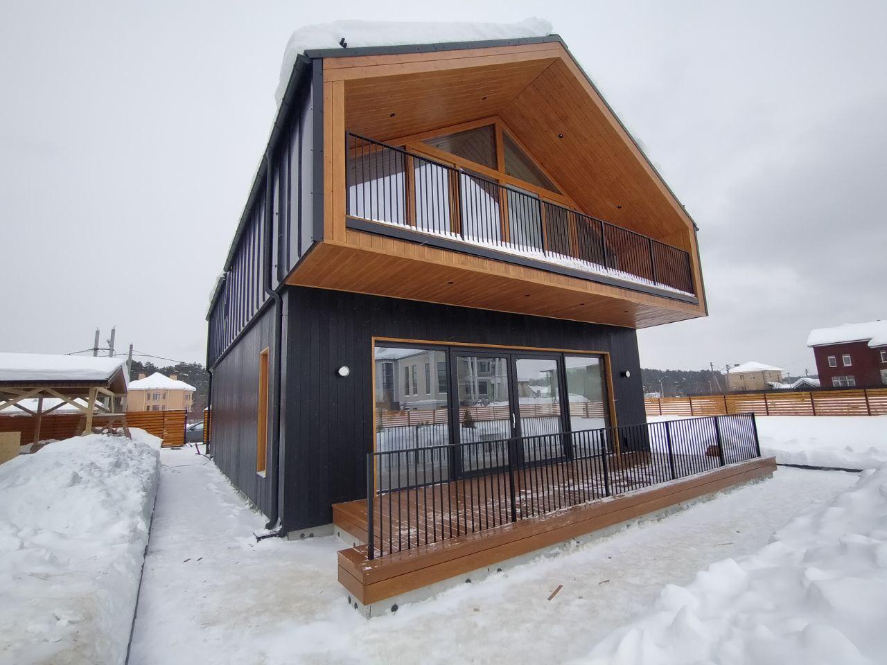 Отделка фасада деревянного дома.