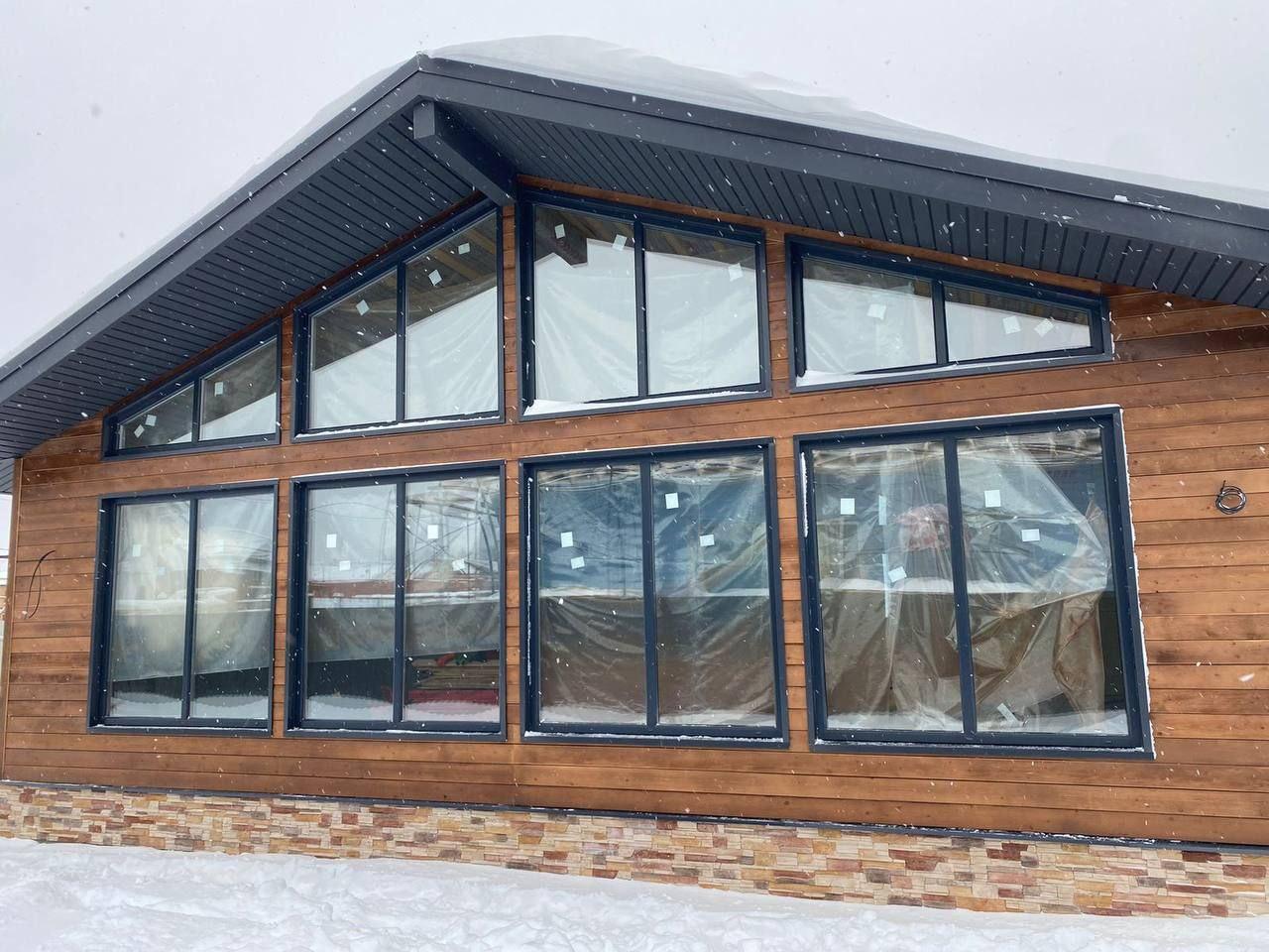 Отделка фасада деревянного дома.