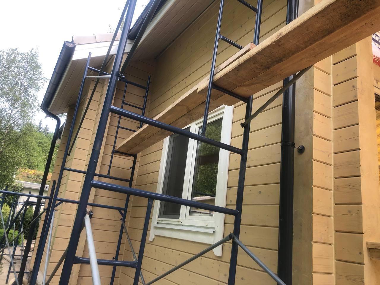 Перекрашивание деревянных домов из клеёного бруса.