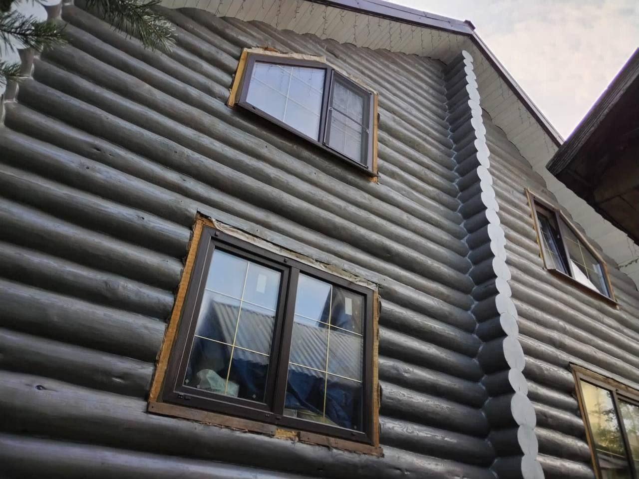 Покраска деревянного дома.