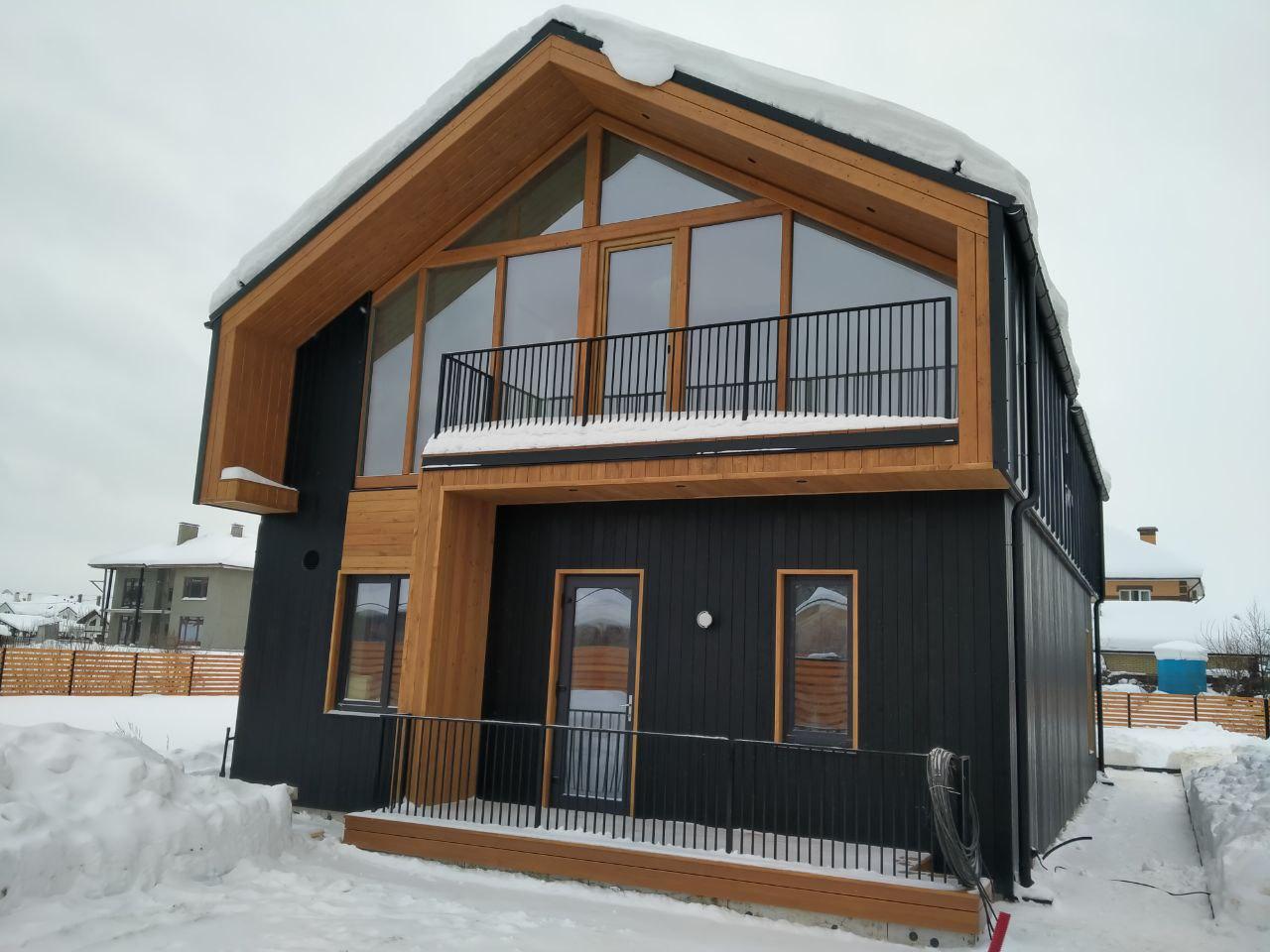 Отделка фасада деревянного дома.