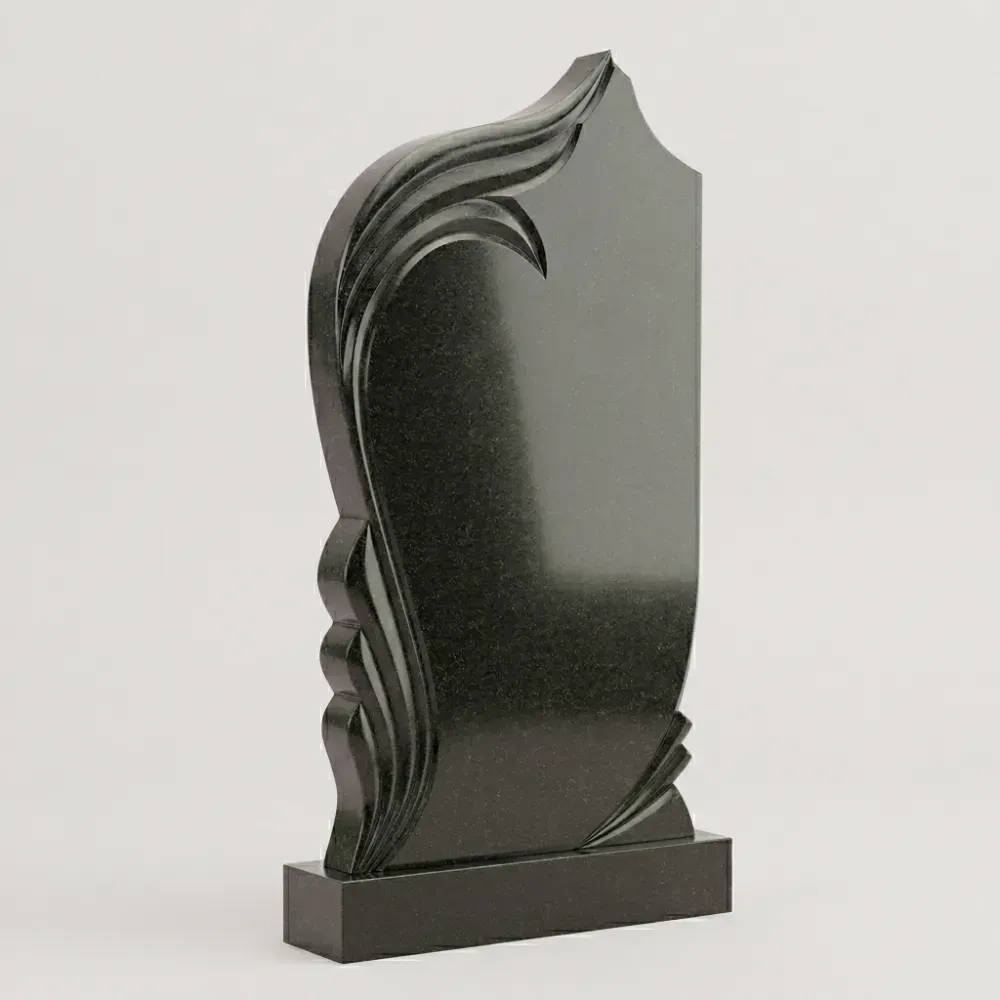 Эксклюзивный гранитный памятник с резным павлином на могилу