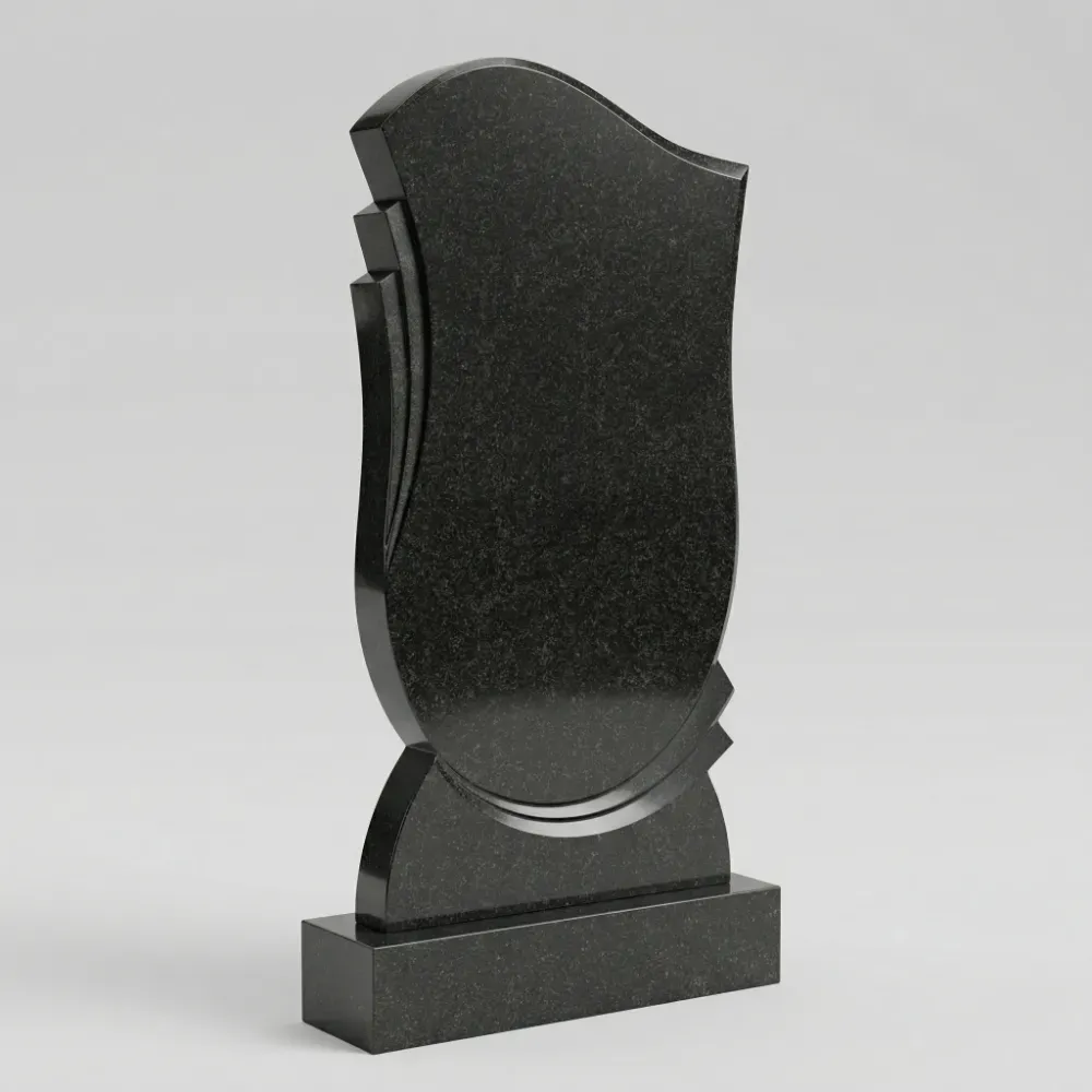 Красивый резной памятник из черного гранита на могилу